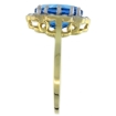 Picture of 10K Yellow Gold Halo Engagement Swiss Blue Topaz Engagement Ring Diamond Accents Oval 9x7mm, sizes 5 - 10